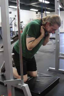 Cable or band crunches, position 1 of 2