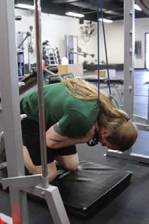 Cable or band crunches, position 2 of 2
