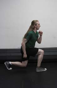 Lunge jumps, position 1 of 3
