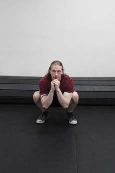 Squat jumps, position 1 of 2